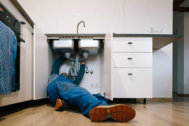 Professional Drain Cleaning technician working in Quinlan, TX